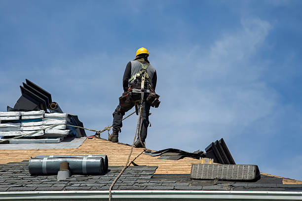 Professional Roof Replacement technician working in Plainview, NY